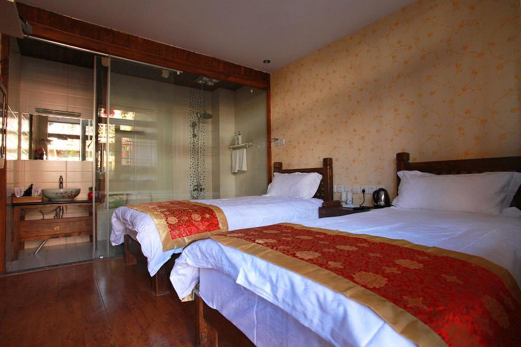 Lijiang Hyhy Inn Rum bild