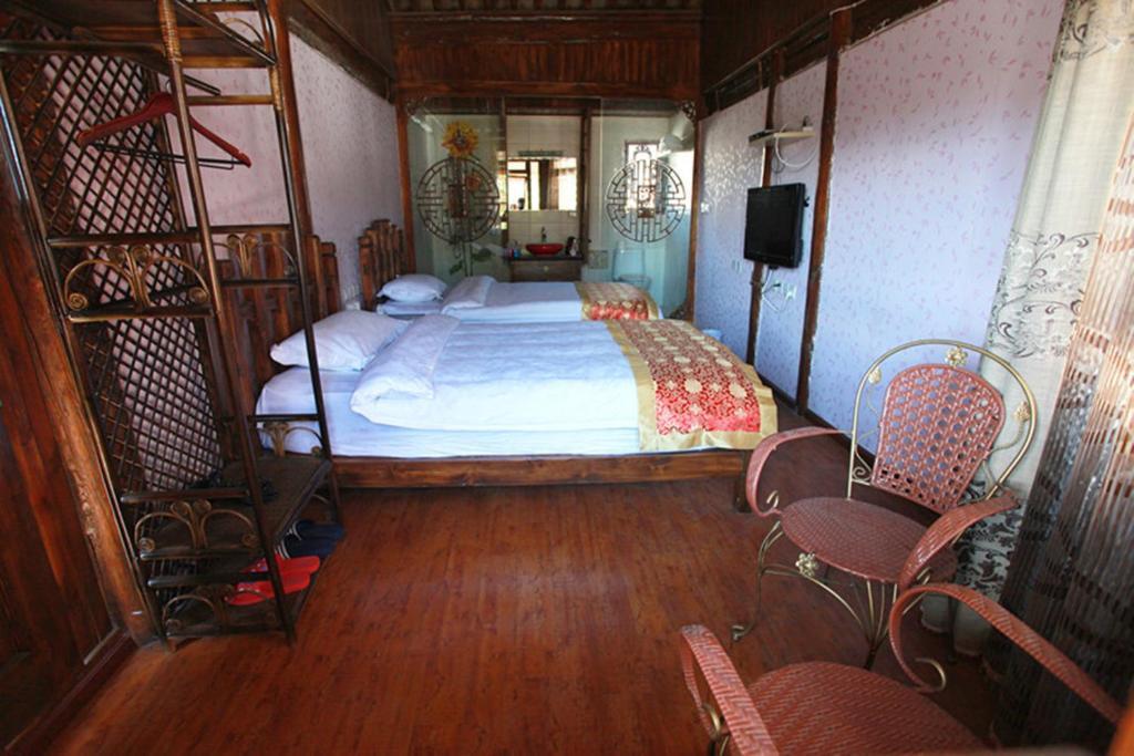Lijiang Hyhy Inn Rum bild